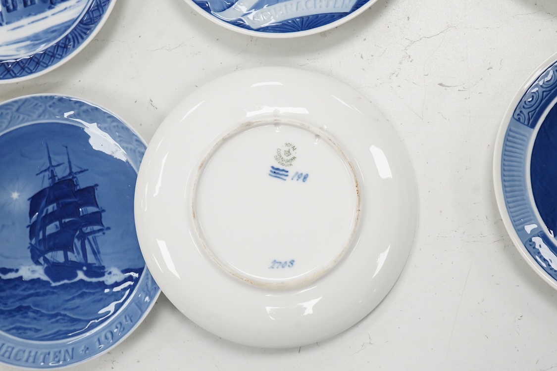 Ten Royal Copenhagen blue and white Christmas plates, 1920-1928, 18cm in diameter